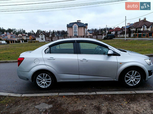 Серый Шевроле Авео, объемом двигателя 1.6 л и пробегом 143 тыс. км за 7000 $, фото 3 на Automoto.ua