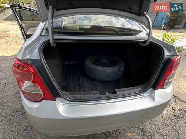 Серый Шевроле Авео, объемом двигателя 1.6 л и пробегом 235 тыс. км за 6600 $, фото 19 на Automoto.ua