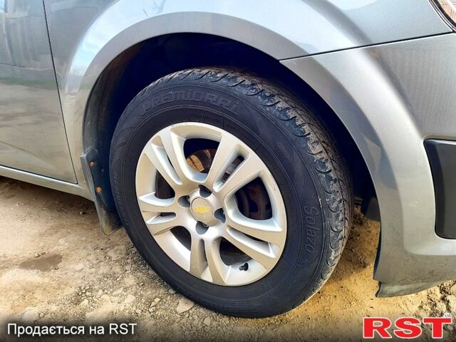 Серый Шевроле Авео, объемом двигателя 1.4 л и пробегом 141 тыс. км за 6200 $, фото 3 на Automoto.ua