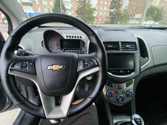 Серый Шевроле Авео, объемом двигателя 1.6 л и пробегом 143 тыс. км за 5600 $, фото 11 на Automoto.ua