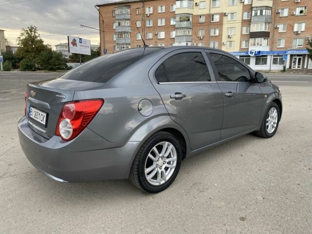 Серый Шевроле Авео, объемом двигателя 1.6 л и пробегом 143 тыс. км за 5600 $, фото 4 на Automoto.ua