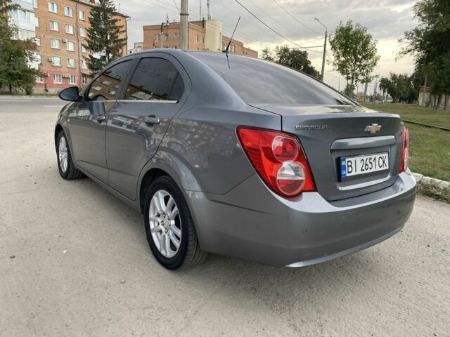 Серый Шевроле Авео, объемом двигателя 1.6 л и пробегом 143 тыс. км за 5600 $, фото 2 на Automoto.ua