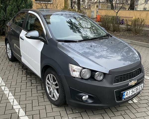 Сірий Шевроле Авео, об'ємом двигуна 1.4 л та пробігом 203 тис. км за 4500 $, фото 1 на Automoto.ua