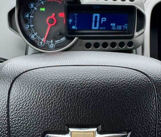 Сірий Шевроле Авео, об'ємом двигуна 1.4 л та пробігом 163 тис. км за 7500 $, фото 12 на Automoto.ua