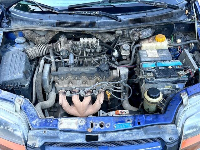 Синий Шевроле Авео, объемом двигателя 1.5 л и пробегом 232 тыс. км за 1950 $, фото 4 на Automoto.ua