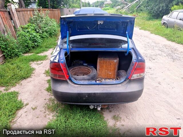 Синій Шевроле Авео, об'ємом двигуна 1.5 л та пробігом 300 тис. км за 1800 $, фото 4 на Automoto.ua