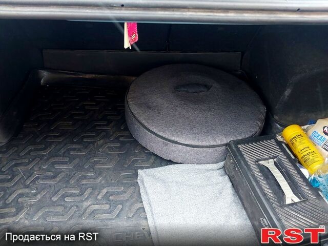 Синій Шевроле Авео, об'ємом двигуна 1.5 л та пробігом 302 тис. км за 3650 $, фото 9 на Automoto.ua