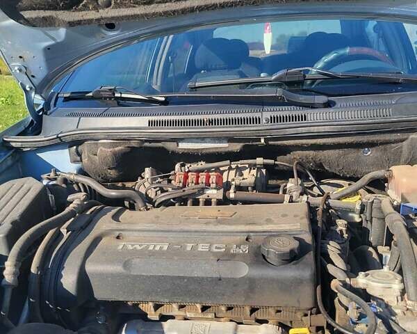 Синий Шевроле Авео, объемом двигателя 1.6 л и пробегом 234 тыс. км за 3500 $, фото 4 на Automoto.ua