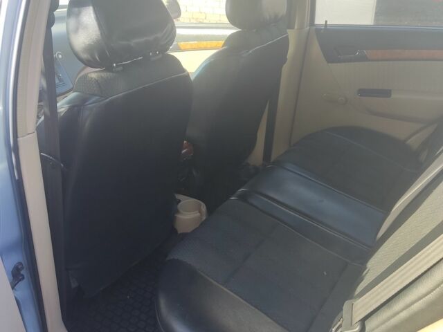 Синий Шевроле Авео, объемом двигателя 1.6 л и пробегом 146 тыс. км за 3650 $, фото 5 на Automoto.ua