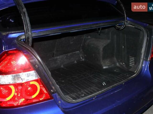 Шевроле Авео 2007 в Хмельницком на Automoto.ua Синий Шевроле Авео, объемом двигателя 1.5 л и пробегом 214 тыс. км за 3850 $, фото 24 на Automoto.ua