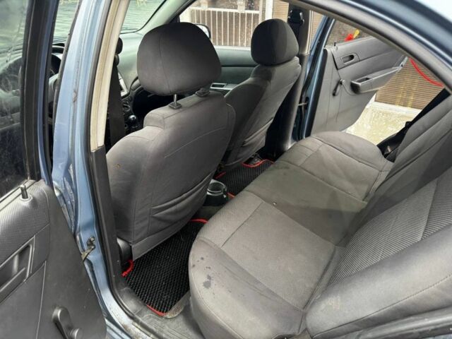 Синий Шевроле Авео, объемом двигателя 1.5 л и пробегом 222 тыс. км за 1999 $, фото 6 на Automoto.ua