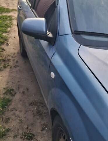 Синий Шевроле Авео, объемом двигателя 1.6 л и пробегом 310 тыс. км за 1550 $, фото 1 на Automoto.ua