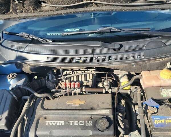 Синий Шевроле Авео, объемом двигателя 1.6 л и пробегом 234 тыс. км за 3500 $, фото 3 на Automoto.ua