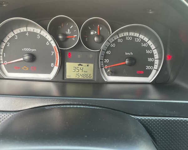 Синій Шевроле Авео, об'ємом двигуна 1.5 л та пробігом 154 тис. км за 4800 $, фото 11 на Automoto.ua