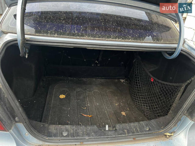 Синий Шевроле Авео, объемом двигателя 1.6 л и пробегом 167 тыс. км за 1500 $, фото 5 на Automoto.ua