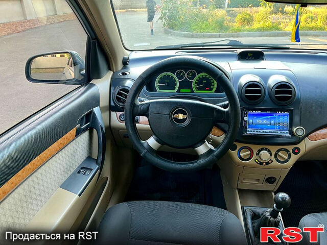 Синий Шевроле Авео, объемом двигателя 1.6 л и пробегом 200 тыс. км за 3450 $, фото 8 на Automoto.ua