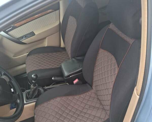 Синий Шевроле Авео, объемом двигателя 1.6 л и пробегом 247 тыс. км за 4000 $, фото 10 на Automoto.ua