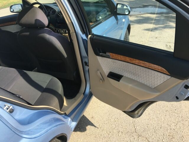 Синий Шевроле Авео, объемом двигателя 1.6 л и пробегом 209 тыс. км за 4200 $, фото 5 на Automoto.ua