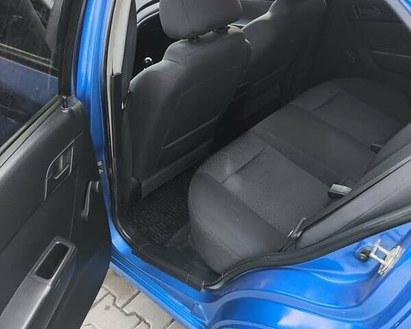 Синий Шевроле Авео, объемом двигателя 1.5 л и пробегом 225 тыс. км за 3300 $, фото 1 на Automoto.ua