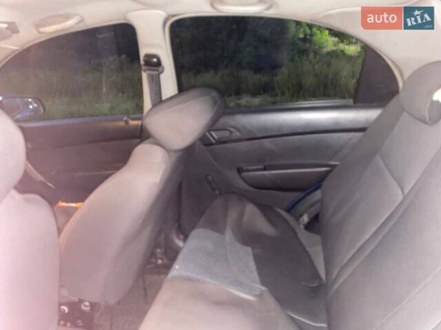 Синий Шевроле Авео, объемом двигателя 1.5 л и пробегом 215 тыс. км за 3300 $, фото 2 на Automoto.ua