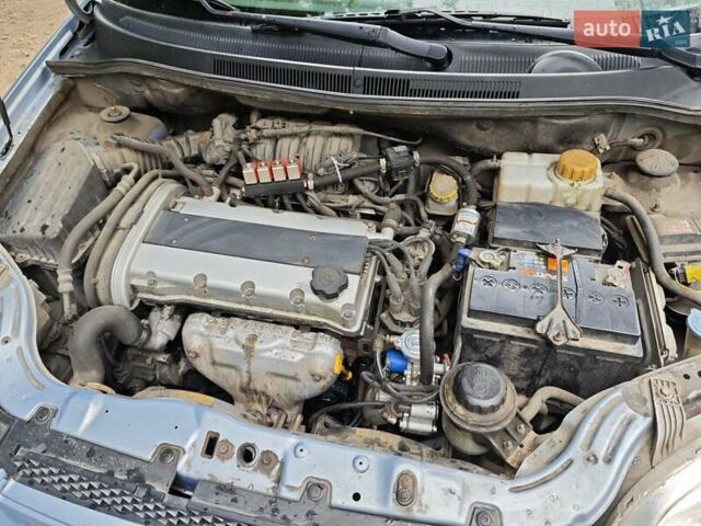 Синий Шевроле Авео, объемом двигателя 1.6 л и пробегом 290 тыс. км за 4000 $, фото 48 на Automoto.ua