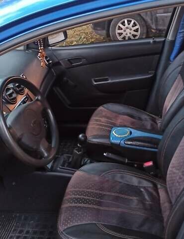 Синій Шевроле Авео, об'ємом двигуна 1.5 л та пробігом 135 тис. км за 4700 $, фото 4 на Automoto.ua