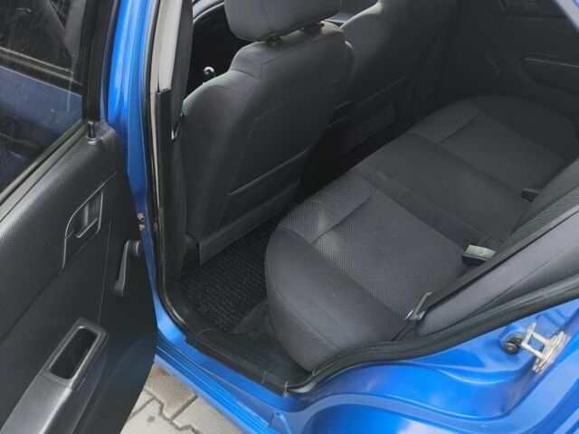 Синий Шевроле Авео, объемом двигателя 1.5 л и пробегом 225 тыс. км за 3300 $, фото 2 на Automoto.ua