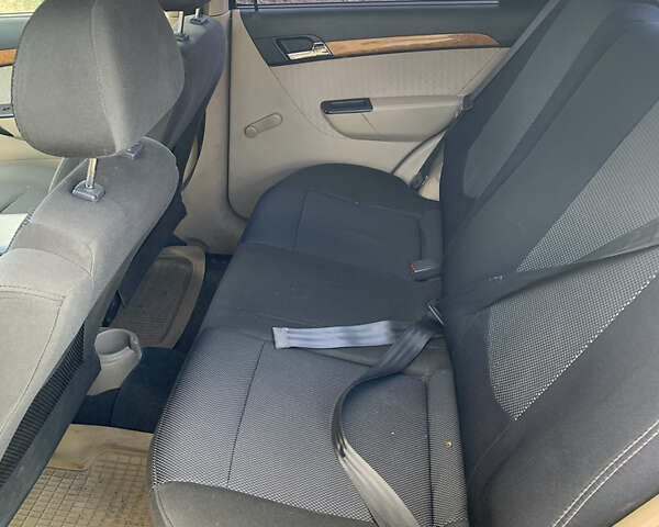 Синий Шевроле Авео, объемом двигателя 1.6 л и пробегом 255 тыс. км за 4000 $, фото 5 на Automoto.ua