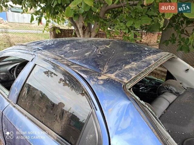 Синій Шевроле Авео, об'ємом двигуна 1.5 л та пробігом 240 тис. км за 1200 $, фото 2 на Automoto.ua