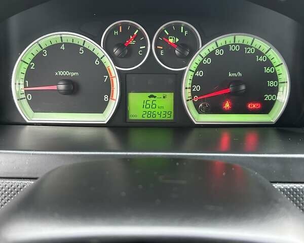 Зелений Шевроле Авео, об'ємом двигуна 2 л та пробігом 286 тис. км за 3600 $, фото 29 на Automoto.ua