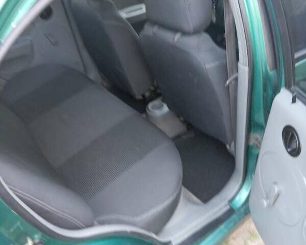 Зеленый Шевроле Авео, объемом двигателя 1.5 л и пробегом 140 тыс. км за 3119 $, фото 8 на Automoto.ua