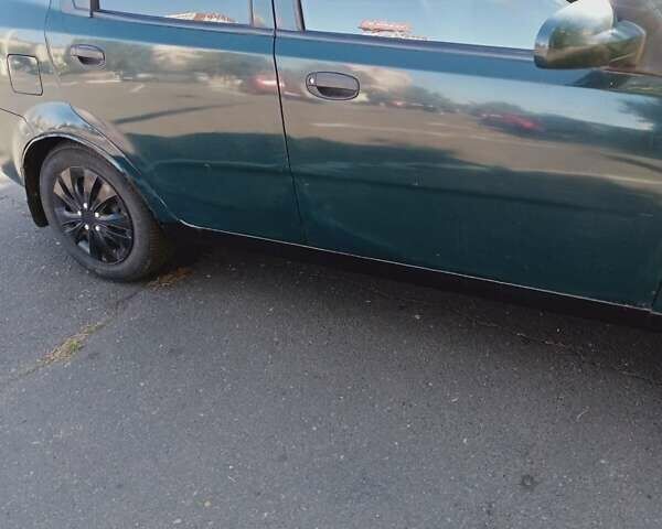 Зелений Шевроле Авео, об'ємом двигуна 1.5 л та пробігом 470 тис. км за 1500 $, фото 3 на Automoto.ua