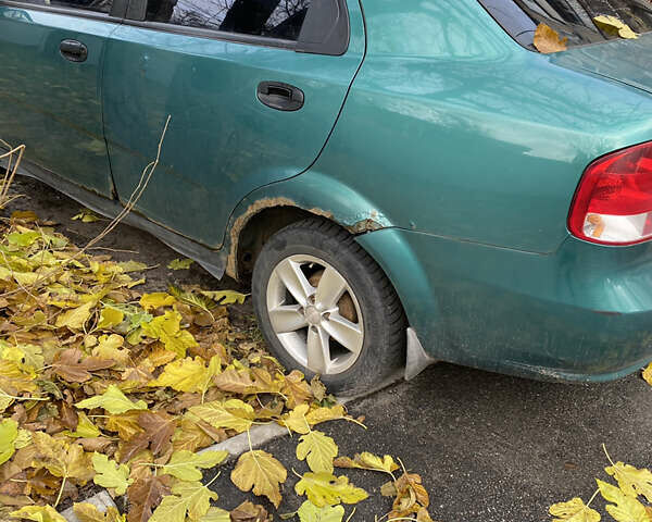 Зеленый Шевроле Авео, объемом двигателя 1.5 л и пробегом 400 тыс. км за 999 $, фото 2 на Automoto.ua