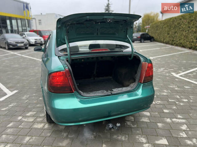 Зелений Шевроле Авео, об'ємом двигуна 1.5 л та пробігом 300 тис. км за 2350 $, фото 38 на Automoto.ua