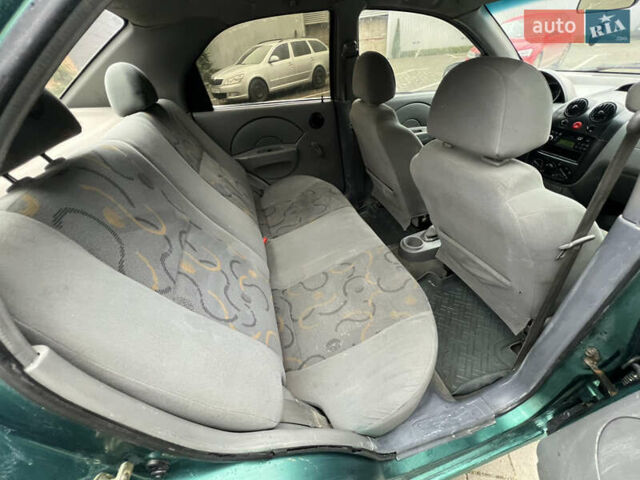 Зелений Шевроле Авео, об'ємом двигуна 1.5 л та пробігом 300 тис. км за 2350 $, фото 28 на Automoto.ua