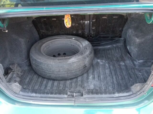 Зелений Шевроле Авео, об'ємом двигуна 1.5 л та пробігом 250 тис. км за 2767 $, фото 6 на Automoto.ua