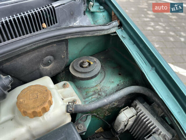 Зелений Шевроле Авео, об'ємом двигуна 1.5 л та пробігом 300 тис. км за 2350 $, фото 36 на Automoto.ua