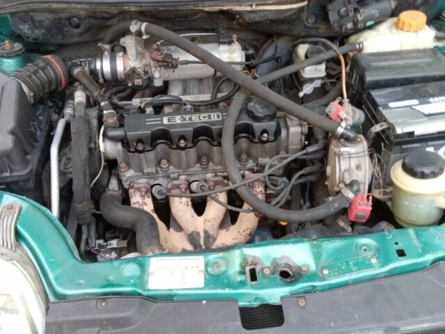 Зелений Шевроле Авео, об'ємом двигуна 1.5 л та пробігом 250 тис. км за 2767 $, фото 5 на Automoto.ua