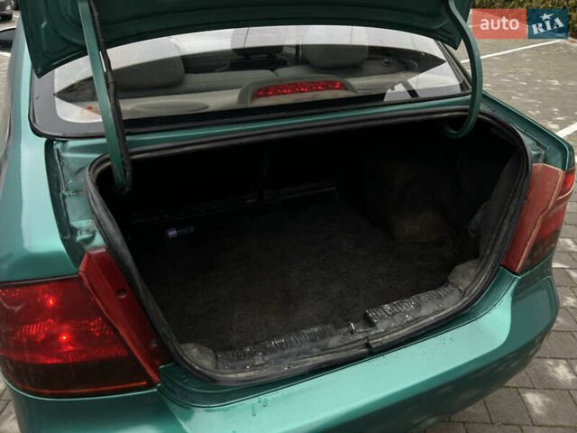 Зелений Шевроле Авео, об'ємом двигуна 1.5 л та пробігом 300 тис. км за 2350 $, фото 39 на Automoto.ua