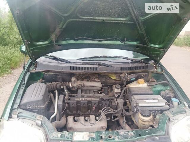 Зеленый Шевроле Авео, объемом двигателя 1.5 л и пробегом 305 тыс. км за 2000 $, фото 14 на Automoto.ua