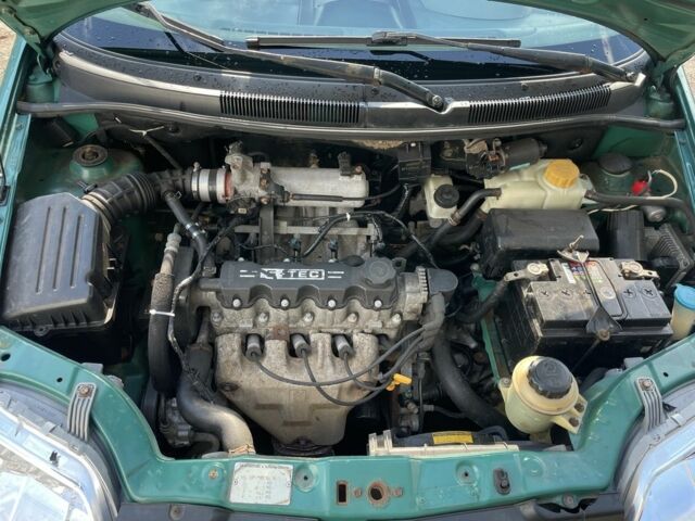 Зеленый Шевроле Авео, объемом двигателя 1.5 л и пробегом 250 тыс. км за 2350 $, фото 7 на Automoto.ua