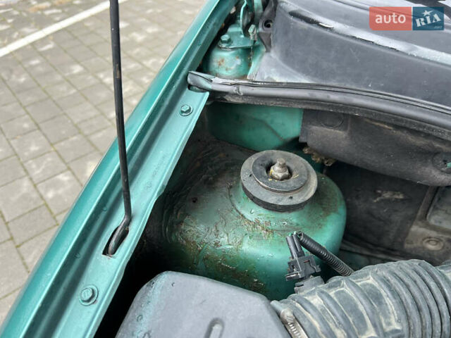 Зелений Шевроле Авео, об'ємом двигуна 1.5 л та пробігом 300 тис. км за 2350 $, фото 35 на Automoto.ua