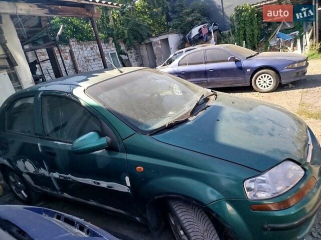 Зеленый Шевроле Авео, объемом двигателя 1.5 л и пробегом 214 тыс. км за 1900 $, фото 3 на Automoto.ua