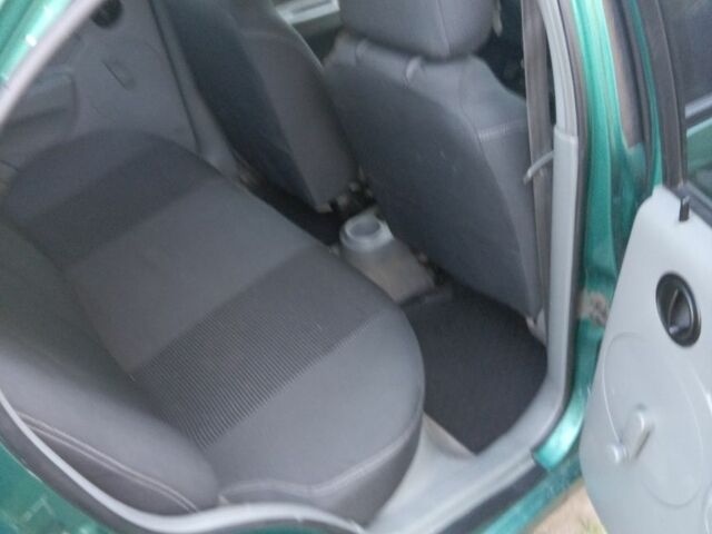 Зелений Шевроле Авео, об'ємом двигуна 1.5 л та пробігом 250 тис. км за 2767 $, фото 4 на Automoto.ua