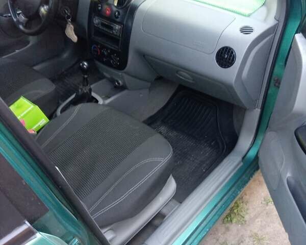 Зеленый Шевроле Авео, объемом двигателя 1.5 л и пробегом 140 тыс. км за 3119 $, фото 6 на Automoto.ua
