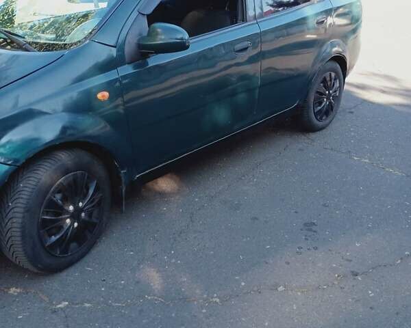 Зелений Шевроле Авео, об'ємом двигуна 1.5 л та пробігом 470 тис. км за 1500 $, фото 4 на Automoto.ua