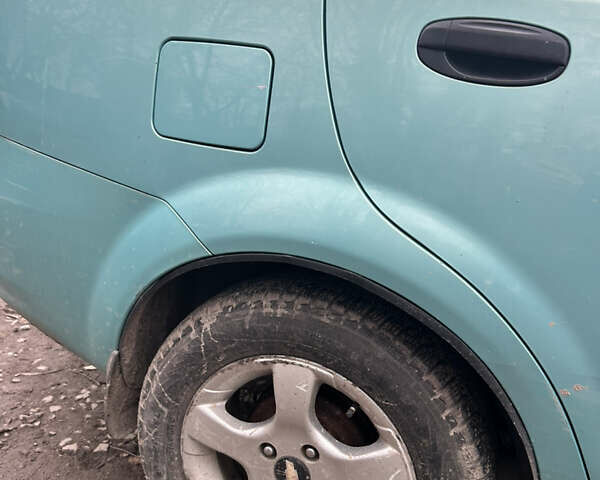 Зеленый Шевроле Авео, объемом двигателя 1.5 л и пробегом 260 тыс. км за 2500 $, фото 7 на Automoto.ua