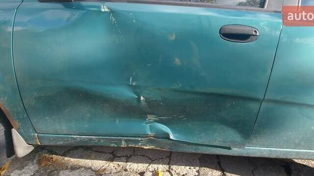 Зеленый Шевроле Авео, объемом двигателя 1.5 л и пробегом 234 тыс. км за 2000 $, фото 12 на Automoto.ua
