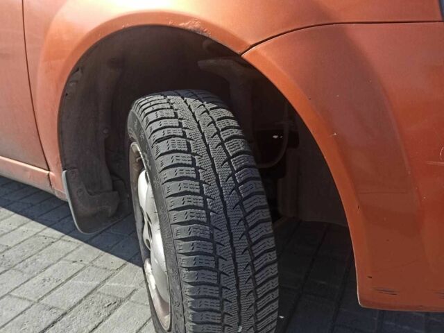 Оранжевый Шевроле Авео, объемом двигателя 1.5 л и пробегом 220 тыс. км за 2990 $, фото 5 на Automoto.ua