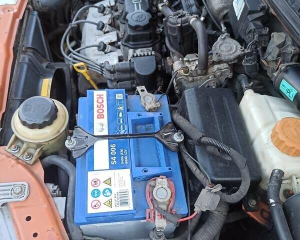 Оранжевый Шевроле Авео, объемом двигателя 1.5 л и пробегом 220 тыс. км за 2500 $, фото 4 на Automoto.ua